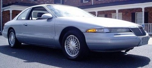 Beautiful silver 2 door hardtop , with all gray leather interior