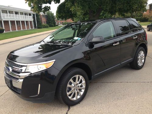 2011 ford edge sel awd sync panoramic,rebuilt salvage,heated leather,no reserve.