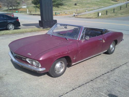 1966 convertible maroon in color.two door.