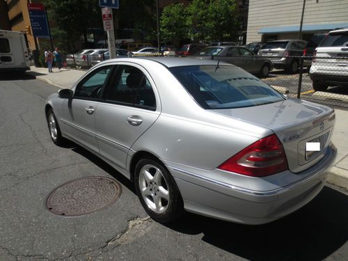 Like new silver 2002 c320 mercedes benz! original owner. treated like a baby!