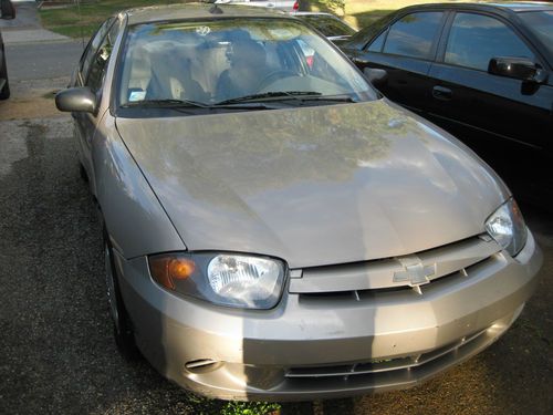 2003 chevy cavalier,no reserve two owners, no accidents, ice cold a/c, cd player
