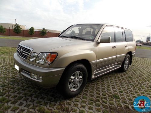 Immaculate showroom condition 99 lexus lx470 low miles kenwood gps camera dvd