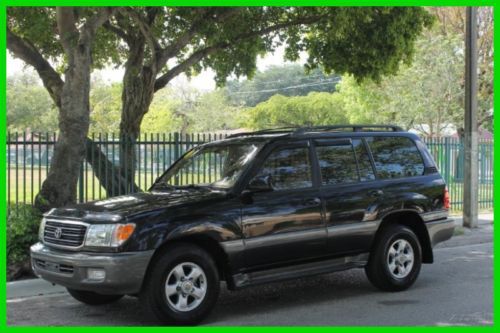 2001 no reserve toyota land cruiser 4x4 3rd row suv clean title no accidents