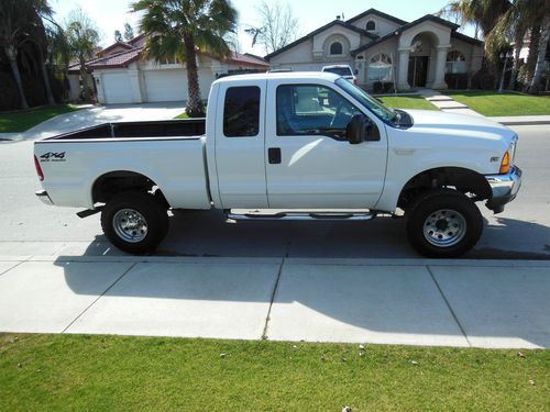 Ford f250 w/xtended cab, lifted, trailer brake