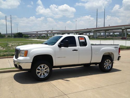 Nice 2007 gmc sierra 2500 hd 4x4 with 2 new sets of tires and wheels, 69k miles!