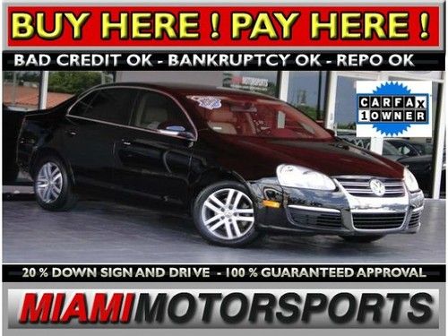 We finance '06 volkswagen sedan 1 owner clean carfax leather sunroof alloy and .