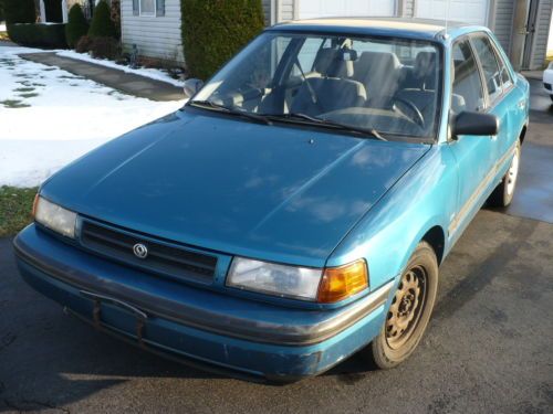 1993 mazda protege dx 4 door 1.8 liter 4 cyl automatic air conditioning used