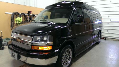 2011 chevy express conversion van 9 pass.  low miles!