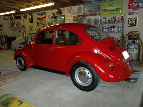 1972 vw beetle,completely restored, new rebuilt motor,200miles, red ,blk.int.