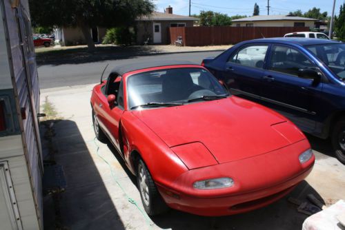 Red mx-5 1st year production lots of miles good driver