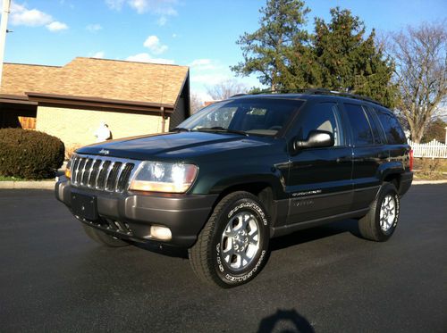 Extra clean 2000 jeep grand cherokee laredo 4x4 leather low miles no accidents