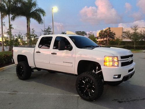 Lifted White Silverado 2014