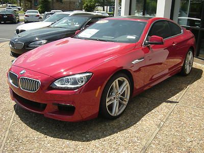 Beautiful imola red bmw 650 coupe.