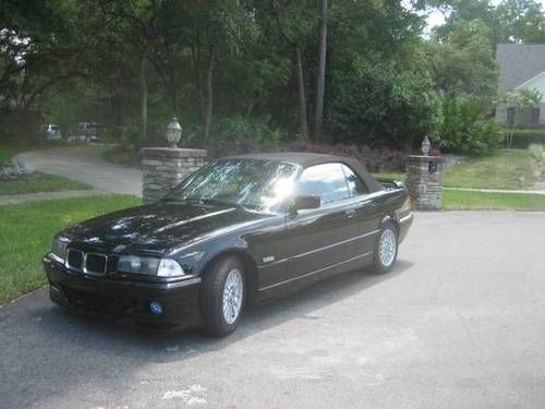 Black convertible w/ black leather interior. sport package,126,000 miles