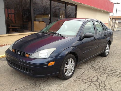 2003 ford focus se 4door auto,gas saver,low miles ,looks and runs great !