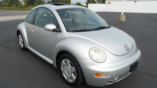 Clean in and out! leather interior! loaded! don't miss out on this great beetle!