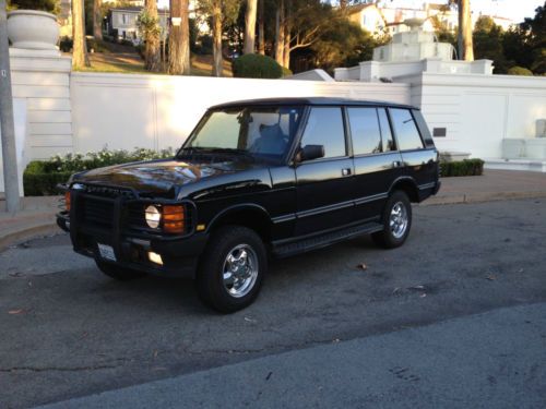 1995 range rover county (lwb) in beluga black with a tan interior