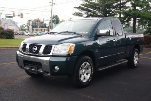 2004 nissan titan le king cab, 4x4, leather, heated seats, 1 owner.