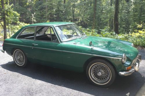 1968 mgb gt coupe; british racing green, chrome wire wheels; good condition