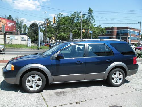 06 freestyle! no reserve 3rd row leather awd looks and drives like new