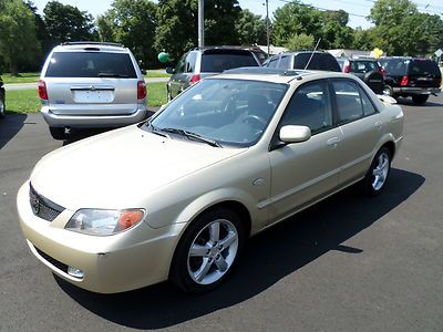 No reserve 2003 mazda protege real clean runs well newer tires