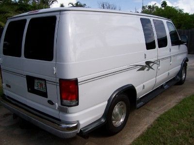 Ford econoline e150 van with rv conversion; sink, fridge, micro, ac/dc, toilet
