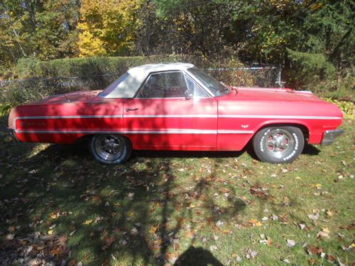 1964 red impala - chopped to a two seater - two door
