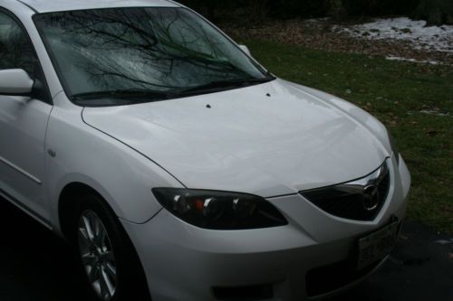 White i touring 4 door mazda 3 very clean, maryland state inspected