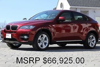 Vermilion red metallic auto awd loaded with options like new factory warranty