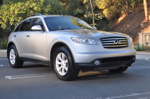 2004 infiniti fx35 silver and tan, low miles and amazing cond. awd, bose stereo