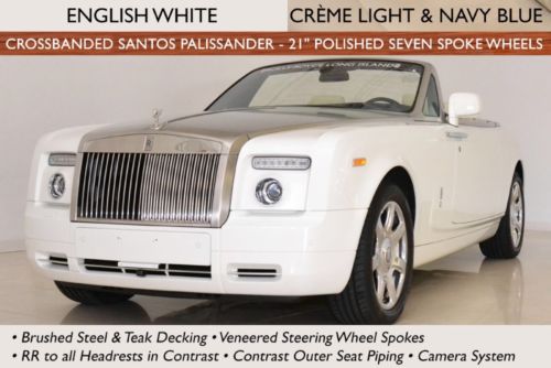 One owner; original msrp $496,705; english white / creme light &amp; navy blue