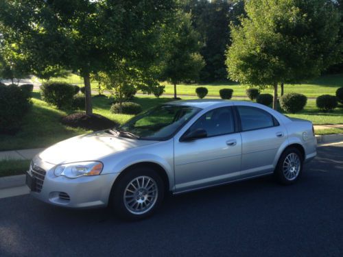 2006 chrysler sebring touring sedan 4-door 2.7l, low mileage, fla. car. as new,