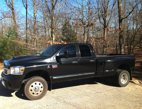 3500 dodge truck 4x4 dually, low miles,leather,completely loaded, $29,000