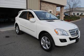 2009 ml 350 4 matic white/beige navigation ,only 26k miles like new