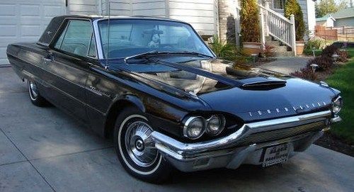 1964 black thuderbird  low miles great shape  tan inside  no dents fun to drive