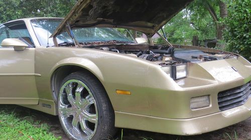 Gold camaro (painted), good running condition, needs a new home.