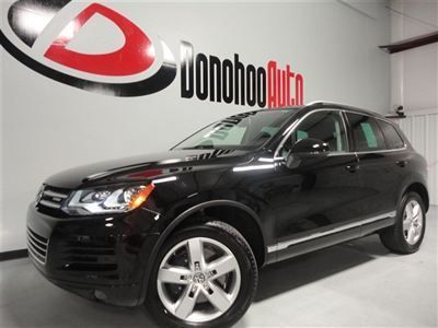 Navigation system, panoramic sunroof, heated leather seats, reverse camera