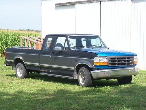1992 ford f150 two wheel drive, two tone black and gray, ext. cab