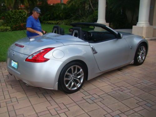 Nissan 370 z convertible touring silver black hydes  garage kept all records