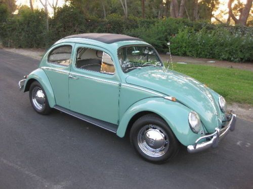62 volkswagen beetle, sedan green, black interior, sun roof, 6 volt, 1.2 liter