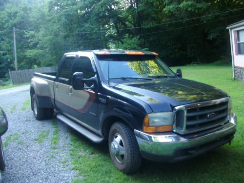 Black and gold ford f350 le dually 2wd  7.3 deisel automatic in good condition