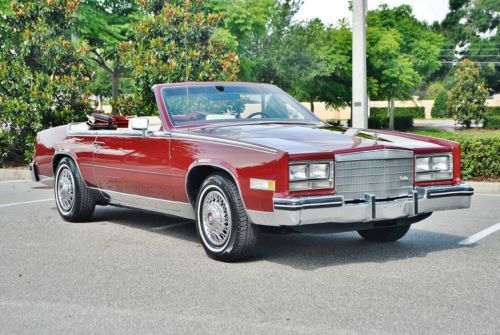 Simply gorgeous red white leather 1984 cadillac biarritz convertible low miles.