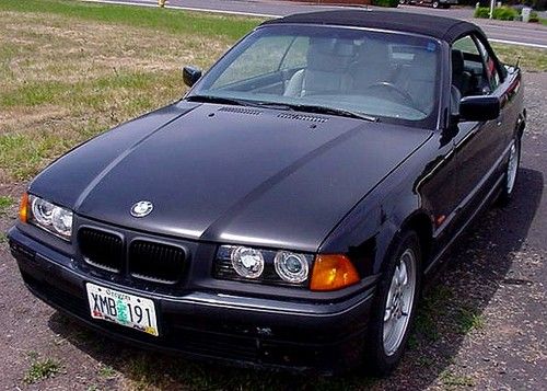 99 bmw black beauty rare 5 speed 323i convertible. summer is almost here!