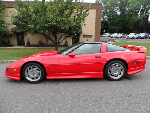 1995 red corvette with chrome wheels