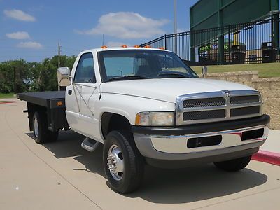 2006 ram 3500 5 speed with 12 feet flat bed texas own and  carfax certified 93k