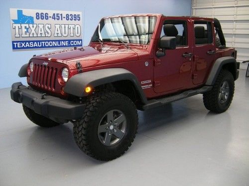 We finance!!!  2012 jeep wrangler unlimited sport 4x4 hard top lifted texas auto