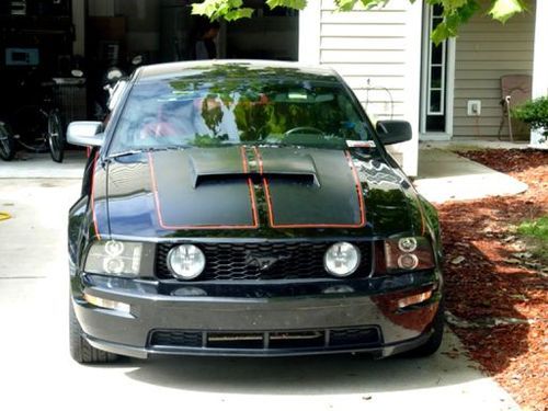 Black with black/red interior, 75125 miles,