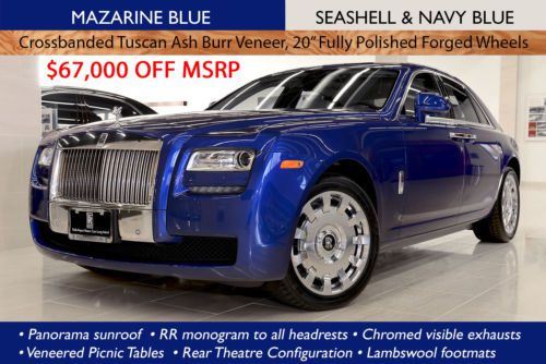 Save $67,000 off msrp; msrp $327,420; mazarine blue; crossbanded tuscan ash burr