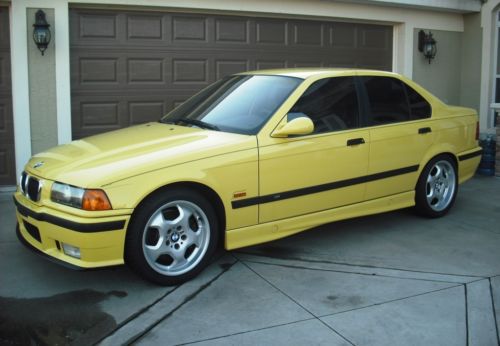 1998 m3, e36 4-door sedan; dakar yellow, mint, one owner/survivor w/ low miles