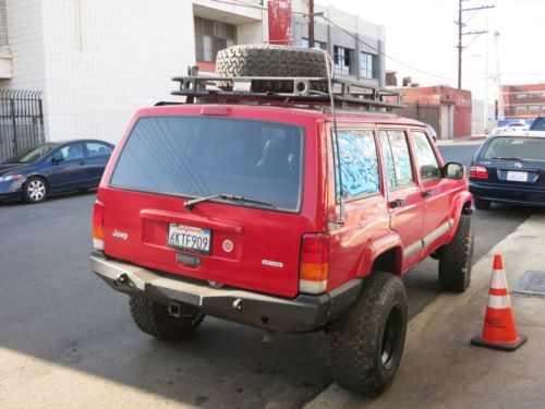 2000 jeep cherokee xj lifted, winch, roof rack etc.